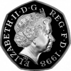 A 50 pence piece in general circulation, showing the Queen's most recent portrait